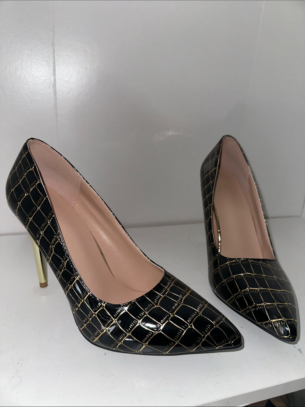 Black and gold heels